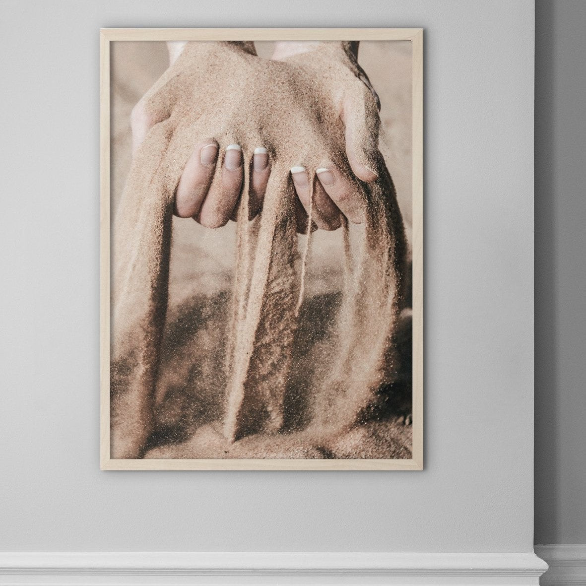 Sand Running Through Hands